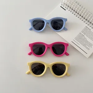Set of 3 colorful round silicone polarized sunglasses for kids in blue, pink, and yellow