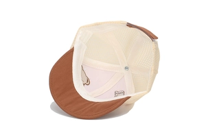 Detail of baby baseball cap featuring breathable mesh fabric and bear ear embroidery