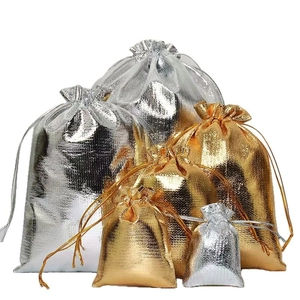 Golden and silver metallic drawstring jewelry pouches for gift packaging and storage