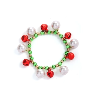 Detail of Christmas beaded bracelet with red bells, green beads and white pearls