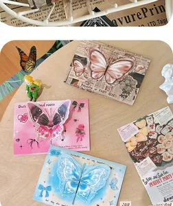 Three 3D butterfly greeting cards with vintage floral designs and artistic lettering