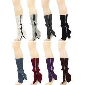 Close-up of ribbed knit leg warmers with side zippers in eight assorted colors