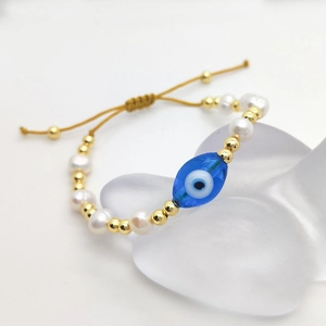 Retro 18K gold bead and freshwater pearl bracelet with blue devil eye charm