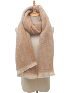Close-up of beige and brown striped scarf texture with soft fringe detail on a mannequin