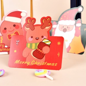 Three Christmas greeting cards featuring Santa Claus, Reindeer and Gingerbread man illustrations