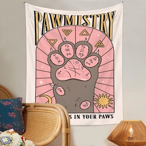Detail of bohemian cat paw tapestry with astrology zodiac symbols for wall decor