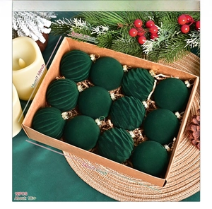 Detail of 12pcs dark green flocked velvet Christmas ball ornaments in a kraft paper box
