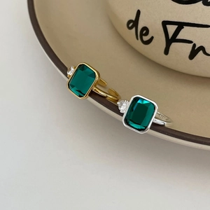 S925 sterling silver ring with rectangular emerald gemstone in gold and silver finish