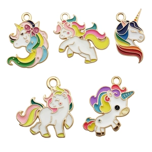 Set of five colorful enamel unicorn pendants with gold metal frames for DIY jewelry making