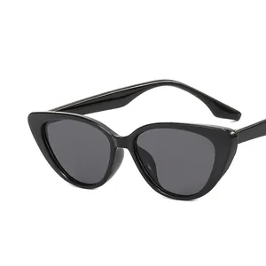 Chic vintage cat eye sunglasses in glossy black frame with dark grey lenses for women