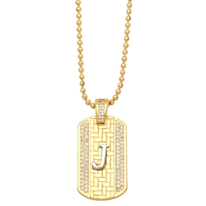 Detail of gold bead chain necklace featuring a zircon-encrusted J letter pendant