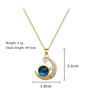 Detail of star and moon necklace with dimensions, weight, and turquoise gemstone