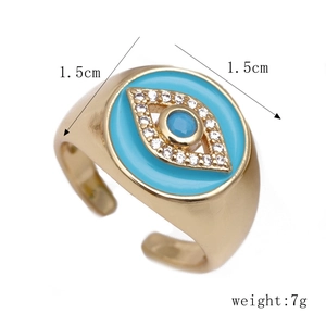 Gold evil eye open ring with light blue enamel, dark blue stone and white crystals