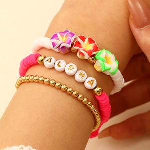 Set de 3 pulseras de temática oceánica con dije de flor de plumeria y cuentas ALOHA