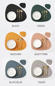 Detail view of water-drop shape faux leather placemats and coasters in six vibrant colors