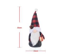 Detailed view of Christmas gnome plush with red plaid hat and gold gift box 33cm size