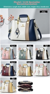 Detail view of contrast color tote bag with dimensions 26x12x19cm and metal handles