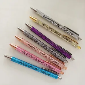 7-piece set of colorful glitter pens with funny daily mottos for a creative office desk