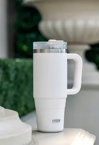 Detailed view of 40oz white stainless steel insulated tumbler with handle and TYESO logo
