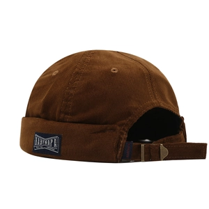Caramel corduroy docker hat with adjustable metal buckle in a vintage streetwear style