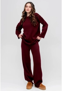 Deep red knitted lounge set featuring a long sleeve crew neck top and wide leg pants