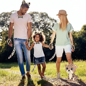 Family outdoor photoshoot wearing leopard print plush ears, bowtie, paws and tail costume set