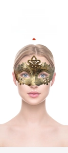 Close-up of golden baroque masquerade mask with intricate hollow-out floral patterns