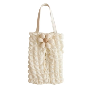 White popcorn textured car tissue holder with 3D floral accent and hanging strap