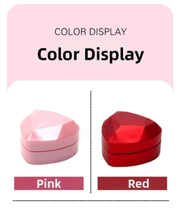 Pink and red heart-shaped jewelry boxes with geometric facets and interior LED light display