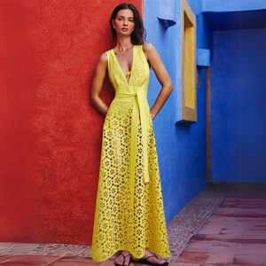 Elegant yellow cutout embroidered one-piece swimsuit with deep V-neck and matching waist belt