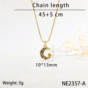 Detail showing moon and star pendant with colorful cubic zirconia and chain length parameters