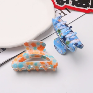 Set di 2 mollette per capelli in acetato con stampe floreali e design a semicerchio