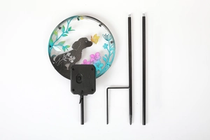 Solar panel back view of garden light with black iron stakes and colorful dog silhouette