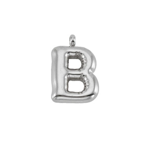 Detail view of a silver puffy bubble letter B pendant with a glossy metallic finish