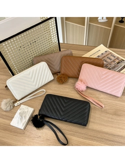 Various colors of long zip wallets with V-quilt stitching and fluffy ball charms
