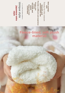 Close-up of thick lamb wool lining and soft plush material for warm winter floor socks