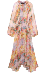 Close-up of bohemian paisley floral dress with drawstring neckline and colorful print
