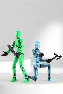 Detail of 3D printed articulated action figures in green and blue showing movable joints