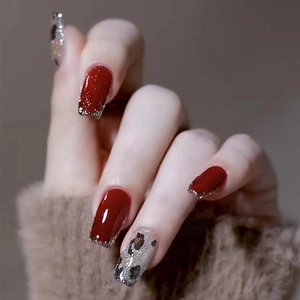 Handmade burgundy press-on nails with leopard print and silver glitter long square tips