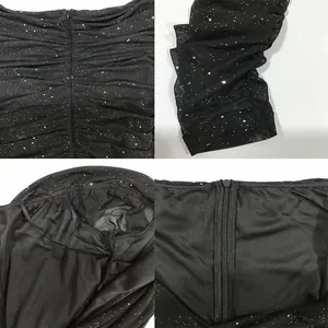Dettagli dell'abito nero glitterato con arricciature, polsini e cerniera invisibile