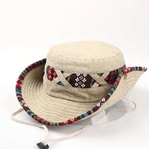 Close-up of khaki cotton sun hat with ethnic woven band and adjustable windproof cord