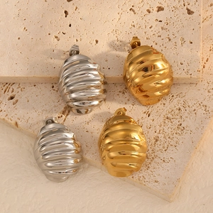 Modern 18k gold and silver textured oval earrings made of surgical stainless steel