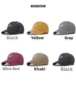 Multiple colors of washed cotton baseball caps with pink scorpion embroidery detail
