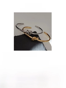 Detailed technical specifications for gold and silver knot bangles in titanium steel