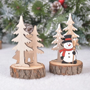 Handcrafted wooden Christmas tree and snowman desk ornaments on natural wood base