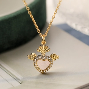 Gold plated copper heart necklace with mother of pearl inlay and zircon wings