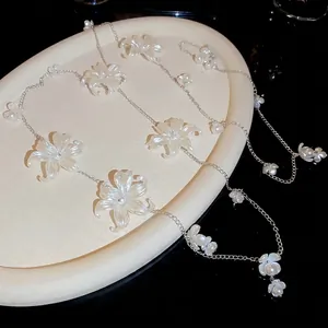 Elegant pearl and white acrylic flower chain belt and long necklace accessory for women