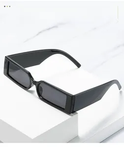 Detail showing high-quality texture and wide-frame temple of rectangle sunglasses