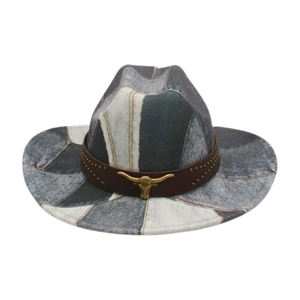 Vintage western cowboy hat with blue patchwork pattern and bull head metal badge