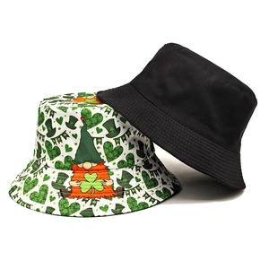 Two St. Patrick's Day bucket hats including black solid and clover gnome print patterns